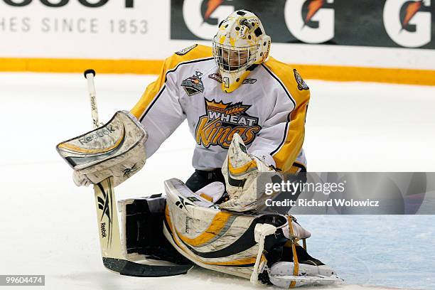 Jacob DeSerres of the Brandon Wheat Kings stops the puck during the game against the Moncton Wildcats at the 2010 Mastercard Memorial Cup Torunament...