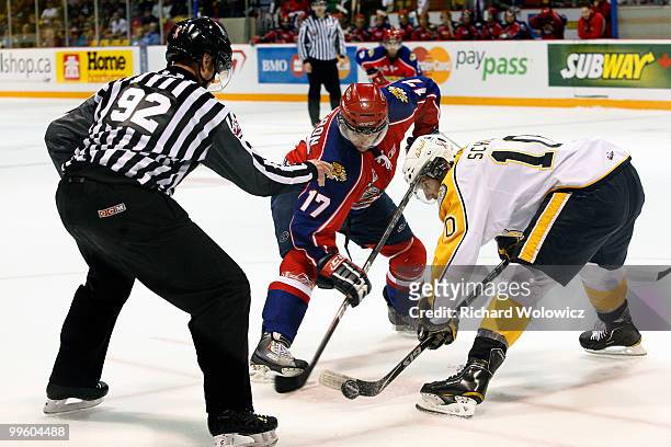 Brayden Schenn of the Brandon Wheat Kings wins a faceoff against Randy Cameron of the Moncton Wildcats during the 2010 Mastercard Memorial Cup...
