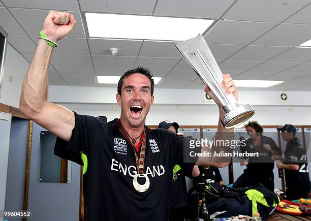 England player Kevin Pietersen with the in the teams dressing room with the trophy after his teams victory against Australia in the final of the ICC...