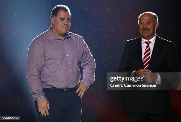 Mal Meninga and Wally Lewis appear on stage during a Captain's tribute before game three of the State of Origin series between the Queensland Maroons...