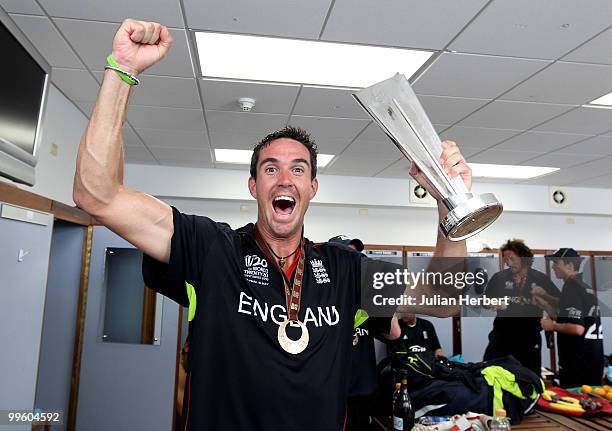 England player Kevin Pietersen with the in the teams dressing room with the trophy after his teams victory against Australia in the final of the ICC...