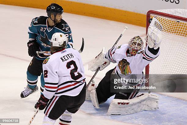 Goaltender Antti Niemi of the Chicago Blackhawks makes a save in the first period against the San Jose Sharks in Game One of the Western Conference...