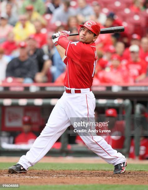 Joey Votto of the Cincinnati Reds swings at a pitch during the game against the St. Louis Cardinals at Great American Ball Park on May 16, 2010 in...