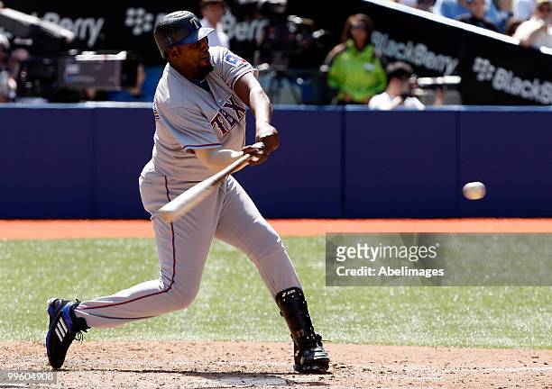 Vladimir Guerrero of the Texas Rangers lines up a ball during a MLB game against the Toronto Blue Jays at the Rogers Centre May 16, 2010 in Toronto,...