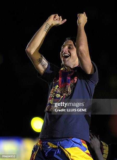 Barcelona's Swedish forward Zlatan Ibrahimovic celebrates after winning the Spanish La Liga title at Camp Nou stadium in Barcelona on May 16, 2010....