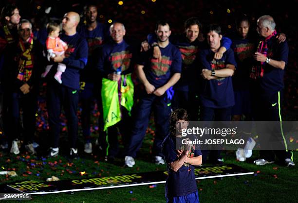 Barcelona's Argentinian forward Lionel Messi celebrates after winning the Spanish La Liga title at Camp Nou stadium in Barcelona on May 16, 2010....