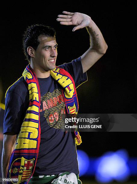 Barcelona's midfielder Sergio Busquets celebrates after winning the Spanish La Liga title at Camp Nou stadium in Barcelona on May 16, 2010. Barcelona...