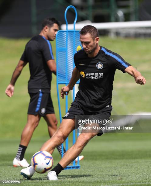 Stefan De Vrij of FC Internazionale kicks a ball during the FC Internazionale training session at the club's training ground Suning Training Center...