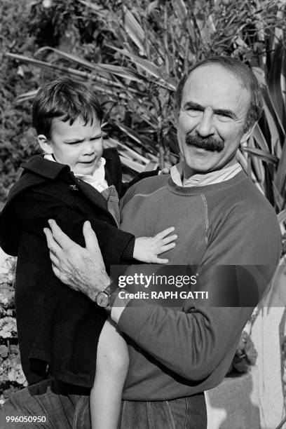 Photo taken on November 12, 1983 shows French actor Jean-Pierre Marielle with his son François on vacation in Nice.