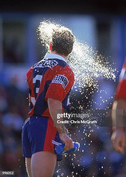 Matt Gidley for Newcastle cools down during the round 19 NRL match played between the Newcastle Knights and the Melbourne Storm held at Marathon...