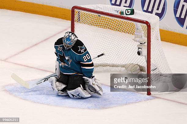 Goaltender Evgeni Nabokovof the San Jose Sharks allows a second period goal to Patrick Sharp of the Chicago Blackhawks in Game One of the Western...