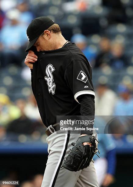 Starting pitcher Gavin Floyd of the Chicago White Sox wipes his brow during the game against the Kansas City Royals on May 16, 2010 at Kauffman...