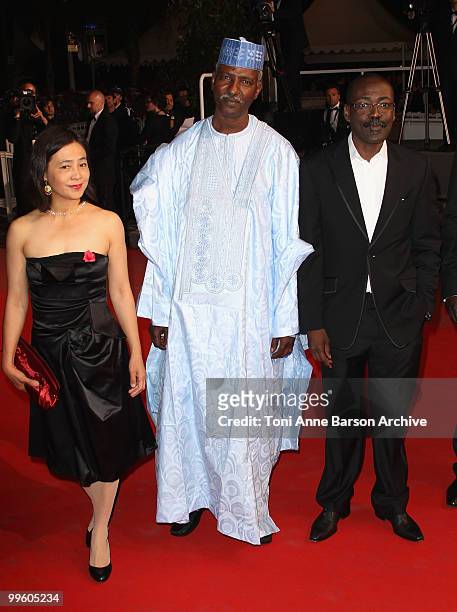 Actress Heling Li, Chadian actor Youssouf Djaoro and Chadian director Mahamat-Saleh Haroun attend the 'A Screaming Man' Premiere held at the Palais...