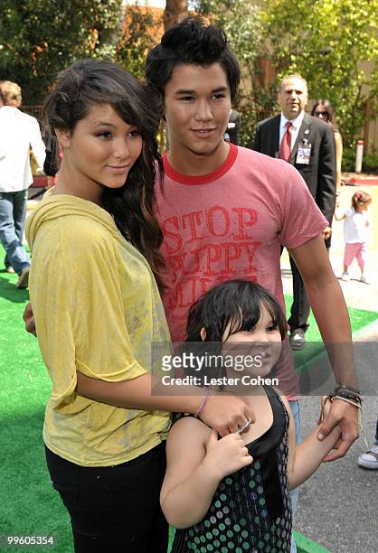 Fivel Stewart, actor Boo Boo Stewart and guest arrive at the "Shrek Forever After" Los Angeles premiere held at Gibson Amphitheatre on May 16, 2010...