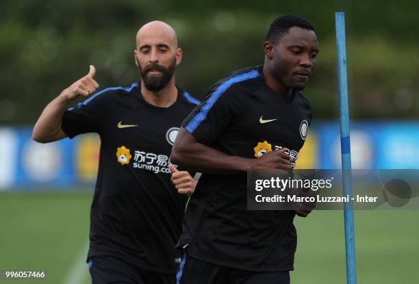 Kwadwo Asamoah and Borja Valero of FC Internazionale run during the FC Internazionale training session at the club's training ground Suning Training...