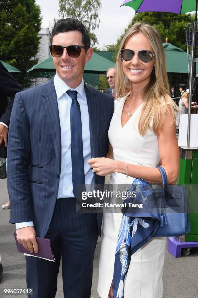 Rory McIlroy and Erica Stoll attend day nine of the Wimbledon Tennis Championships at the All England Lawn Tennis and Croquet Club on July 11, 2018...