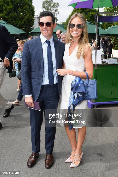 Rory McIlroy and Erica Stoll attend day nine of the Wimbledon Tennis Championships at the All England Lawn Tennis and Croquet Club on July 11, 2018...