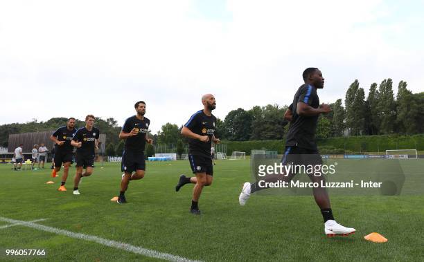 Kwadwo Asamoah, Borja Valero, Antonio Candreva, Facundo Colidio and Danilo D Ambrosio of FC Internazionale run during the FC Internazionale training...