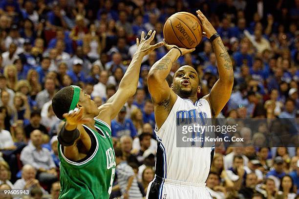 Jameer Nelson of the Orlando Magic attempts a shot against Rajon Rondo of the Boston Celtics in Game One of the Eastern Conference Finals during the...