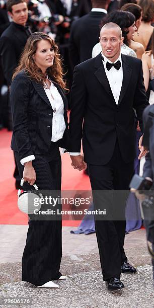 Laure Manaudou and Frederick Bousquet depart the 'The Princess of Montpensier' Premiere held at the Palais des Festivals of Cannes on May 16, 2010 in...