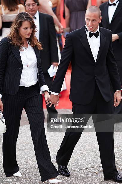 Laure Manaudou and Frederick Bousquet depart the 'The Princess of Montpensier' Premiere held at the Palais des Festivals of Cannes on May 16, 2010 in...