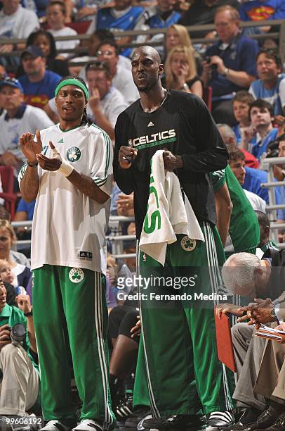 Kevin Garnett and Marquis Daniels of the Boston Celtics react to a play against the Orlando Magic in Game One of the Eastern Conference Finals during...