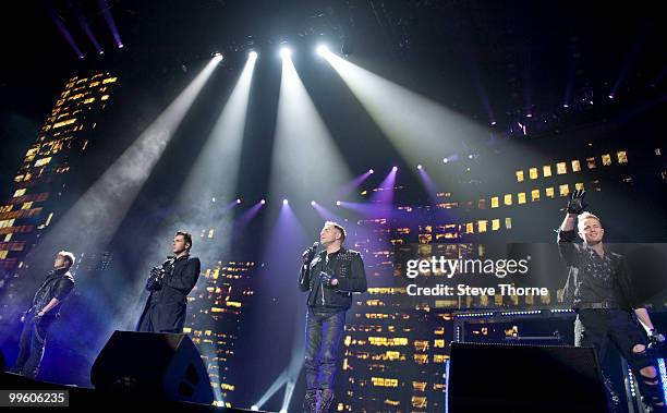 Kian Egan, Mark Feehily, Shane Filan and Nicky Byrne of Westlife perform on stage at LG Arena on May 16, 2010 in Birmingham, England.