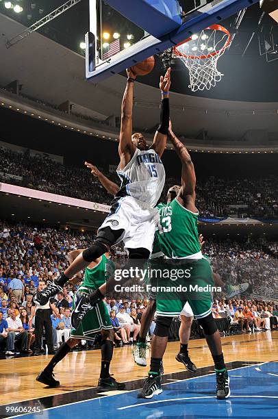 Vince Carter of the Orlando Magic shoots against Kendrick Perkins of the Boston Celtics in Game One of the Eastern Conference Finals during the 2010...