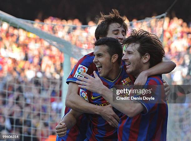 Pedro Rodriguez of Barcelona celebrates with Lionel Messi after he scored Barcelona's second goal during the La Liga match between Barcelona and Real...