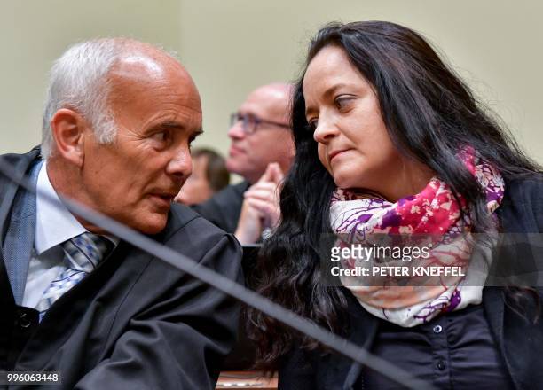 Lawyer Hermann Borchert and defendant Beate Zschaepe wait in a Munich courtroom before the proclamation of sentence in her trial as the only...