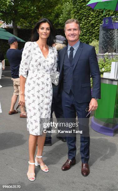 David Coulthard and Karen Minier attend day nine of the Wimbledon Tennis Championships at the All England Lawn Tennis and Croquet Club on July 11,...