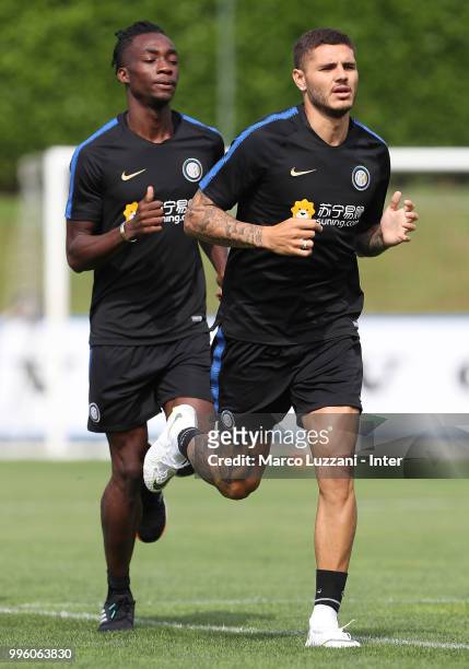 Mauro Emanuel Icardi and Yann Karamoh of FC Internazionale run during the FC Internazionale training session at the club's training ground Suning...