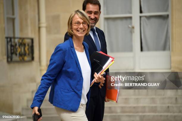 French Culture Minister Francoise Nyssen and French Junior Minister for the Relations with Parliament Christophe Castaner leave on July 11, 2018...