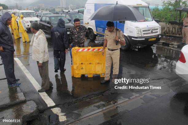 Cracks developed on Saket bridge Thane on Tuesday, following which one lane has been closed for traffic, on July 10, 2018 in Mumbai, India. Heavy...