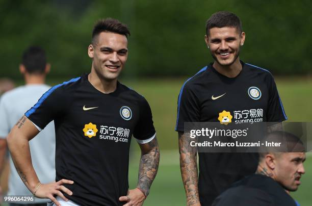 Lautaro Martinez and Mauro Emanuel Icardi of FC Internazionale run during the FC Internazionale training session at the club's training ground Suning...