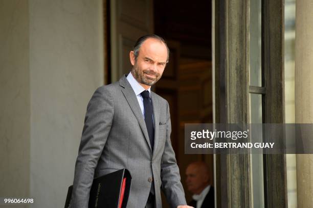 French Prime Minister Edouard Philippe leaves on July 11, 2018 after a weekly cabinet meeting at the Elysee palace in Paris.