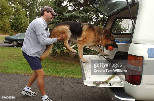 Capitol Police Dog, Fanto, is helped into a truck by his handler Techinician Shawn Haynes near their Waldorf, Md. Home. The 11 year old German...