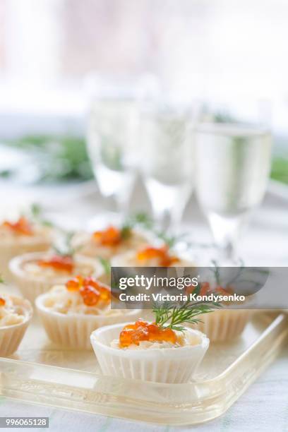 tartlets with cream cheese and red caviar - red caviar stock pictures, royalty-free photos & images