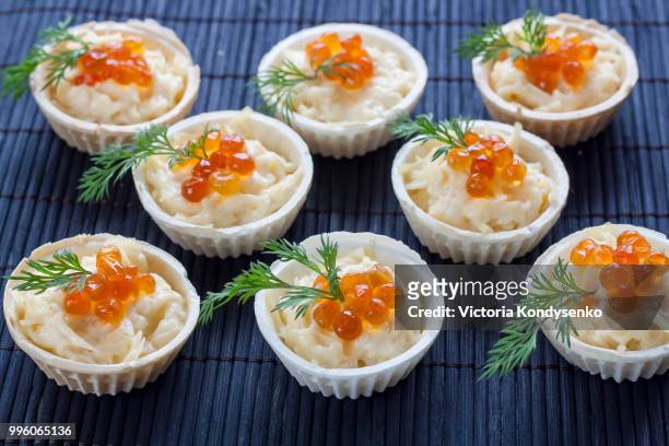 tartlets with cream cheese and red caviar - red caviar stock pictures, royalty-free photos & images