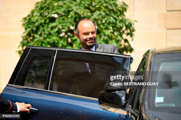 French Prime Minister Edouard Philippe enters a car as he leaves on July 11, 2018 after a weekly cabinet meeting at the Elysee palace in Paris.