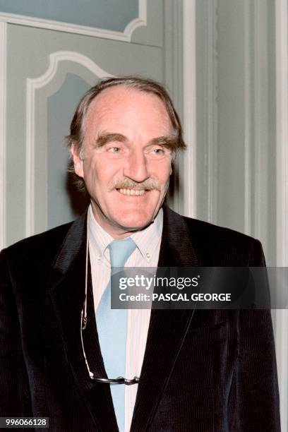 French writer Jean Raspail poses on December 2, 1986 in Paris after being awarded by the French Chateaubriand Prize for his book "Qui se souvient des...