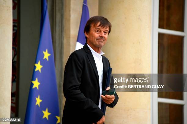 French Minister for the Ecological and Inclusive Transition Nicolas Hulot leaves on July 11, 2018 after a weekly cabinet meeting at the Elysee palace...