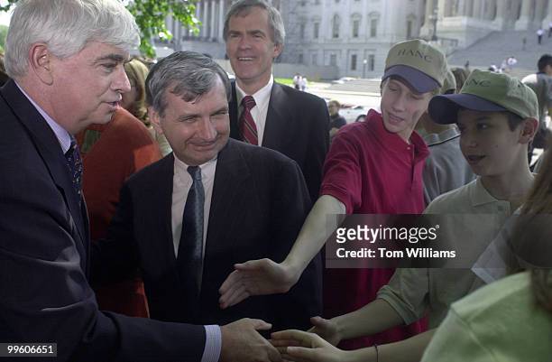 Chris Dodd along with Jack Reed and Jeff Bingaman greet school kids after a press conference in which Senators spoke about the Elementary and...