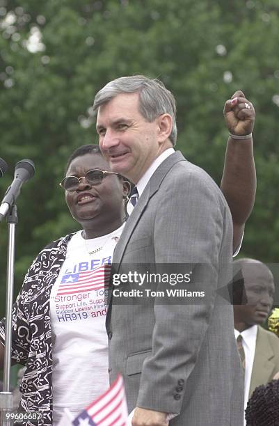 Sen Jack Reed stands with Donlette Norris if Rhode Island after deliver a speech at a rally in support of the Liberian Refugees Immigration...