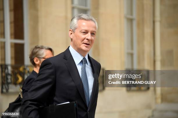 French Economy Minister Bruno Le Maire leaves on July 11, 2018 after a weekly cabinet meeting at the Elysee palace in Paris.