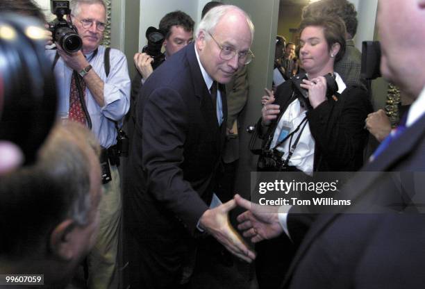 Dick Cheney greets Senators before a press conference in the Senate Studio regarding the tax cut passed by the Senate.