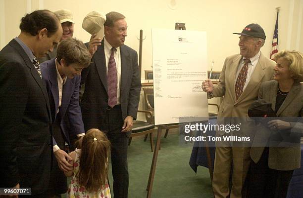 From left, Michael Mliken, Reps Heather Wilson and daughter Caitlin, John Shinkus, Mike Oxley, Martin Sabo and Ileana Ros-Lehtinen are on hand to...