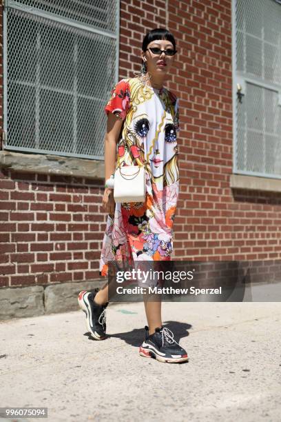 Michelle Song is seen on the street attending Men's New York Fashion Week wearing Comme des Garcon, Maison Margiela, Balenciaga on July 10, 2018 in...