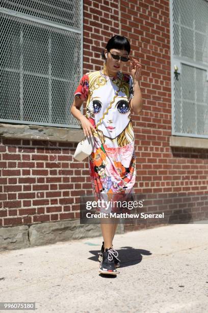 Michelle Song is seen on the street attending Men's New York Fashion Week wearing Comme des Garcon, Maison Margiela, Balenciaga on July 10, 2018 in...