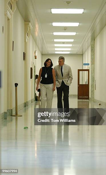 Rep. James Traficant, D-Ohio, walks with staffer Lori Pesci during a break the House Ethics Committee hearing which is investigating him, Wednesday.